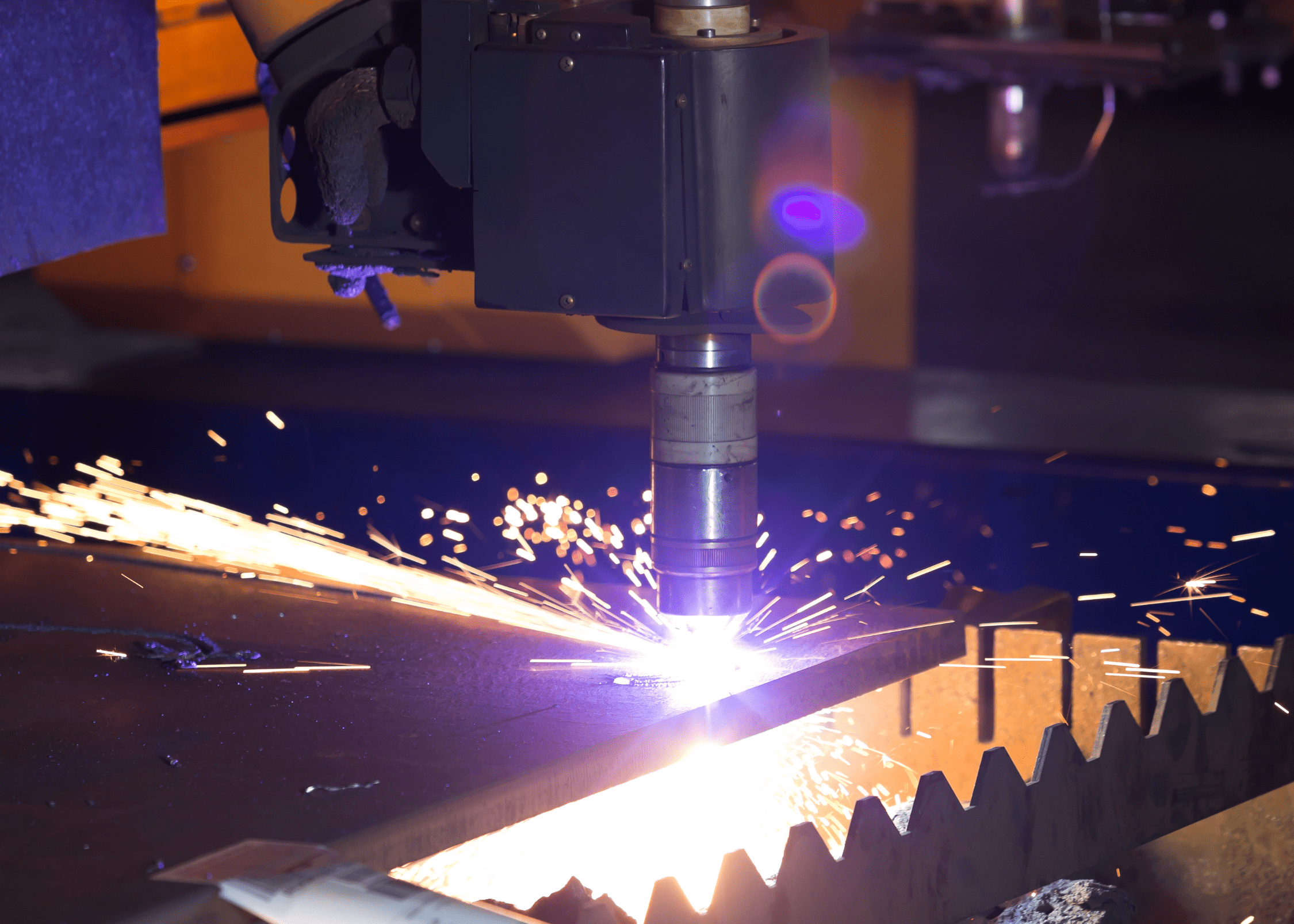 Plasma Cutting – CMDI Precision Metal Cutting in Ivanhoe, Virginia Plasma metal cutting at CMDI in Southwest Virginia with sparks flying from precision cuts.