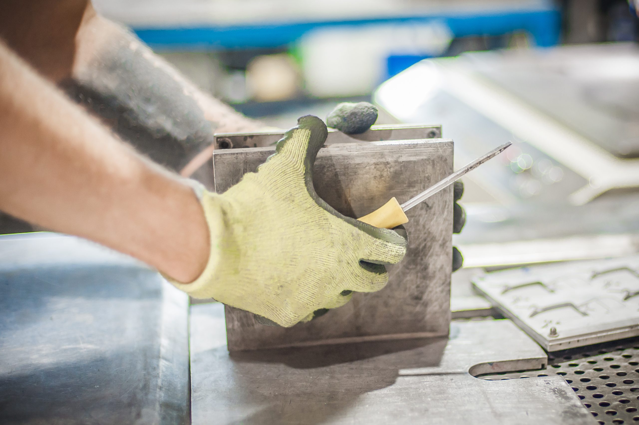 Worker technician work with soft PVC liquid rubber in mold Professional worker technician work with soft PVC liquid rubber in mold in factory production workplace. Manufacture working operating process