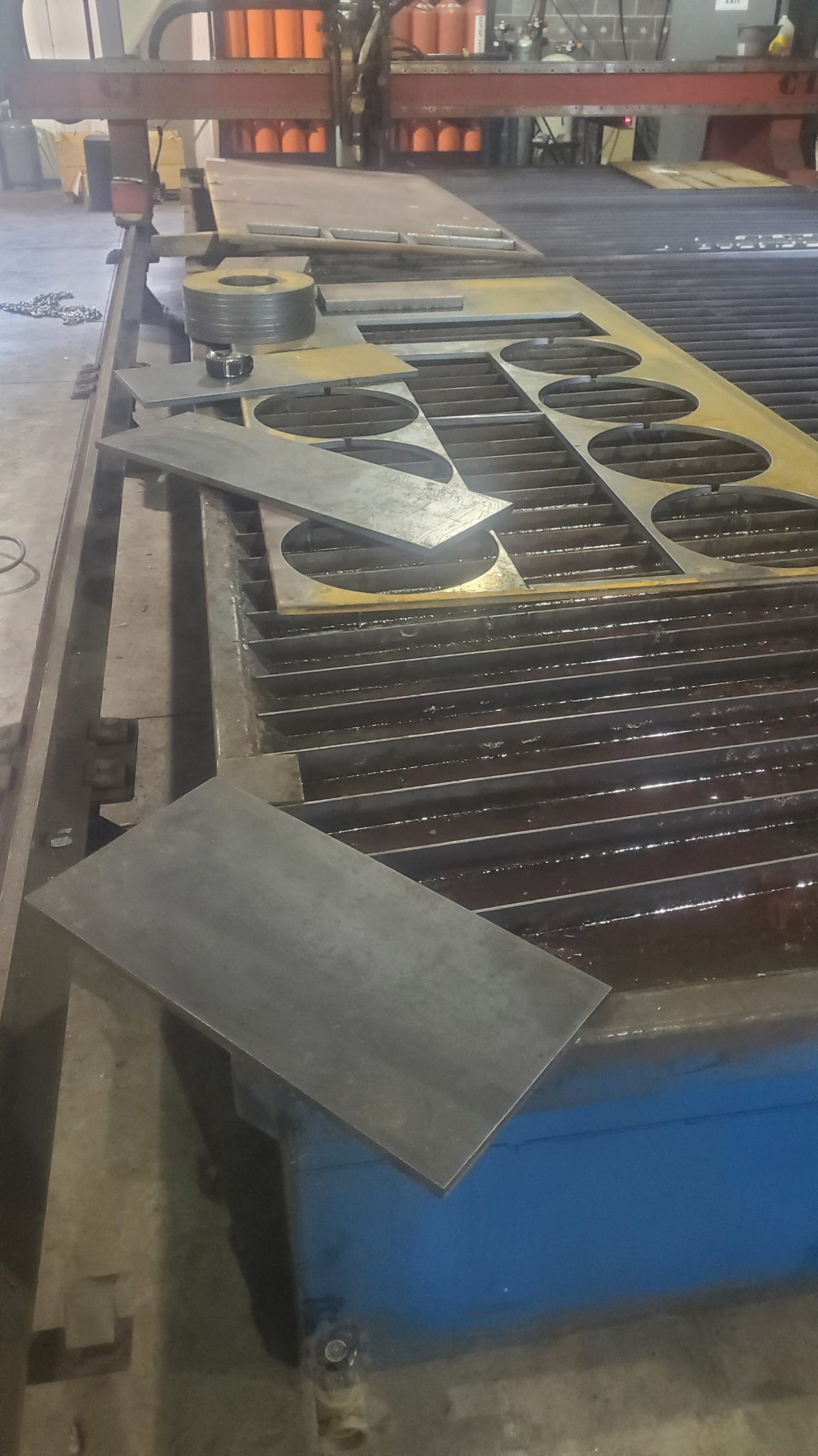 Fabricated steel plates with curved edges from a plasma cutting project in Southwest VA.