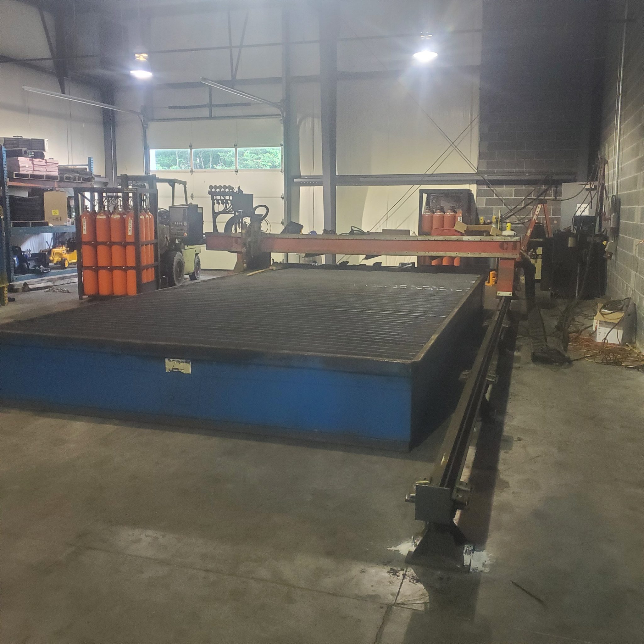 Metal cutting table at CMDI’s Ivanhoe facility used for large-scale fabrication near Wytheville, VA.