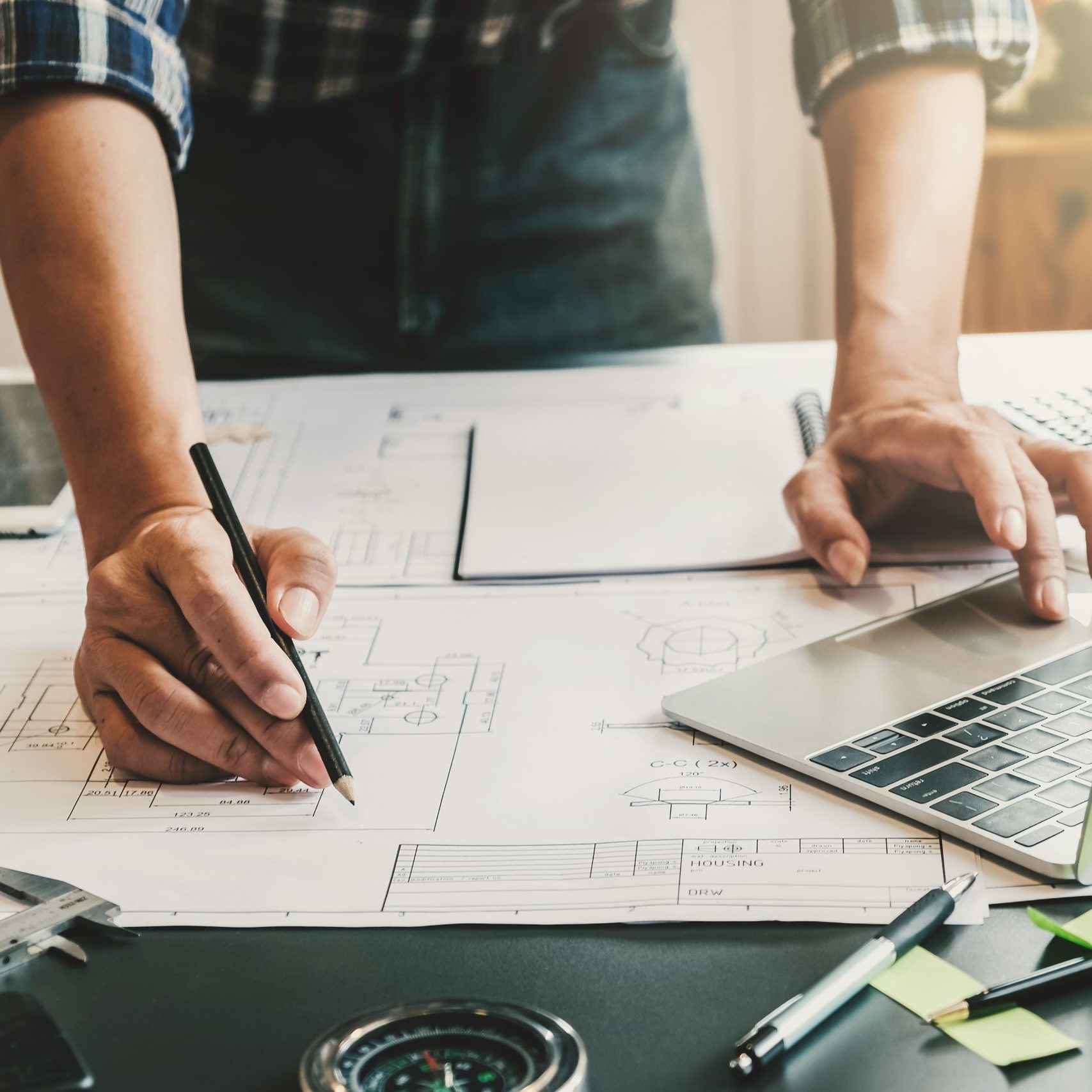 Rubber Part Design for Manufacturing – CMDI Engineer reviewing part drawings for design for manufacturing analysis